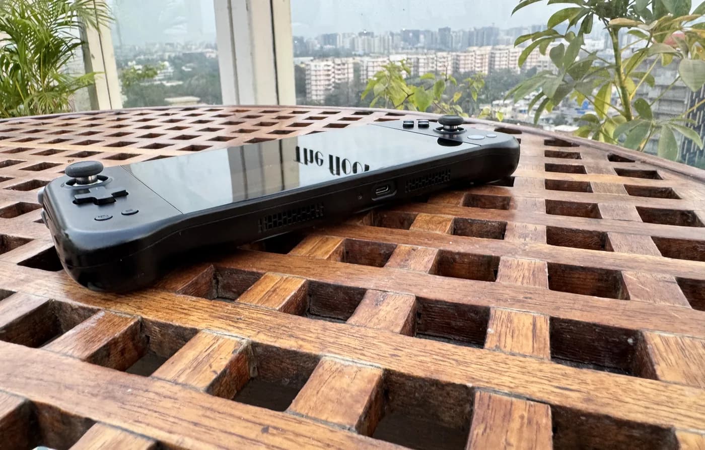 JOY Genesis prototype lying on a wooden table, seen from the lower edge